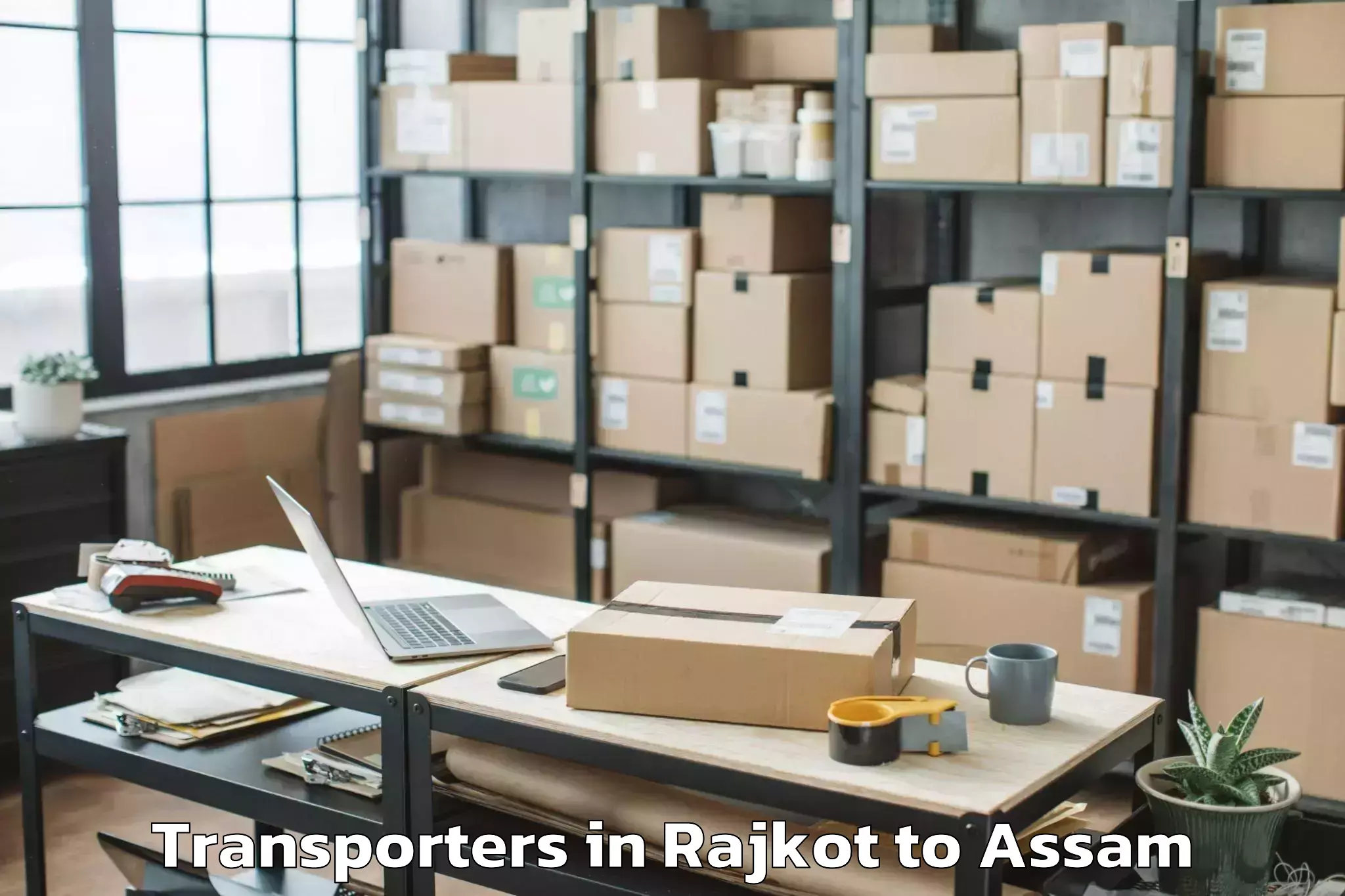 Book Rajkot to Dhuburi Transporters Online